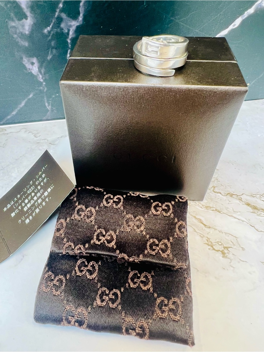Gucci Spiral G Logo Snake Ring crafted from 9.25 sterling silver. GUC size 7.5